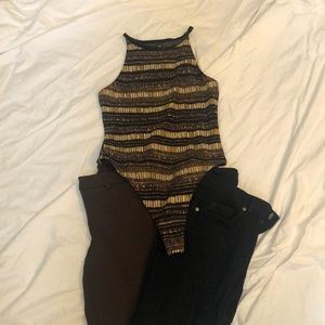 Body suit, brown dress pants, and black ripped jeans